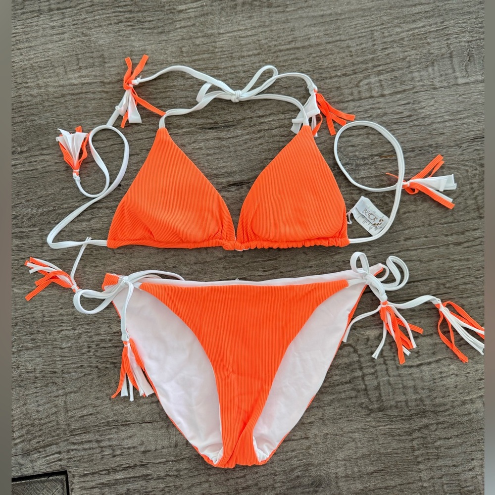 Becca ribbed reversible triangle bikini with tassels size large *orange & white*